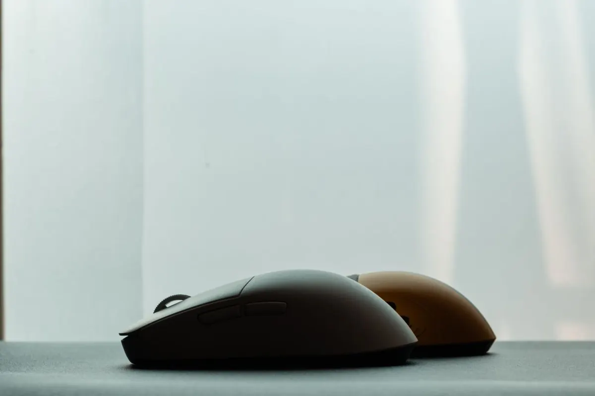 Two wireless gaming mice side by side showing how a DPI change alters mouse feel