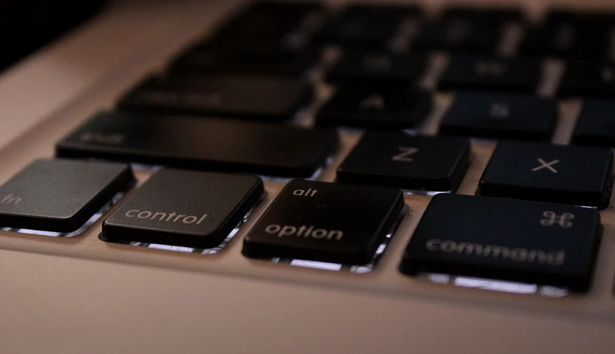 Close-up stock photo of Control, Option and Command modifier keys used for keyboard shortcuts