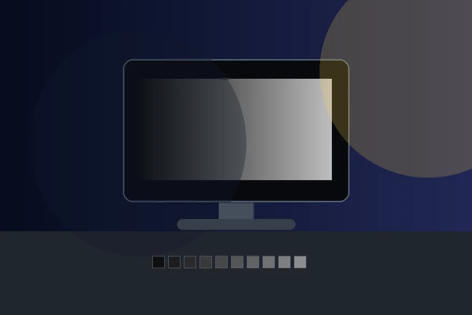 Monitor in a dim room with grayscale bars showing why room light changes gamma test perception