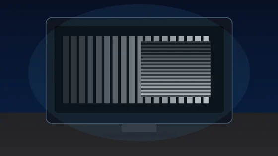 Dark monitor showing grayscale gamma bars and a stripe-blend pattern for a monitor gamma test