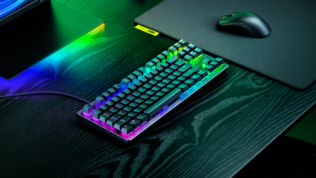 Razer Huntsman V3 HE Magnetic Tenkeyless 8KHz keyboard on a dark gaming desk with RGB backlighting