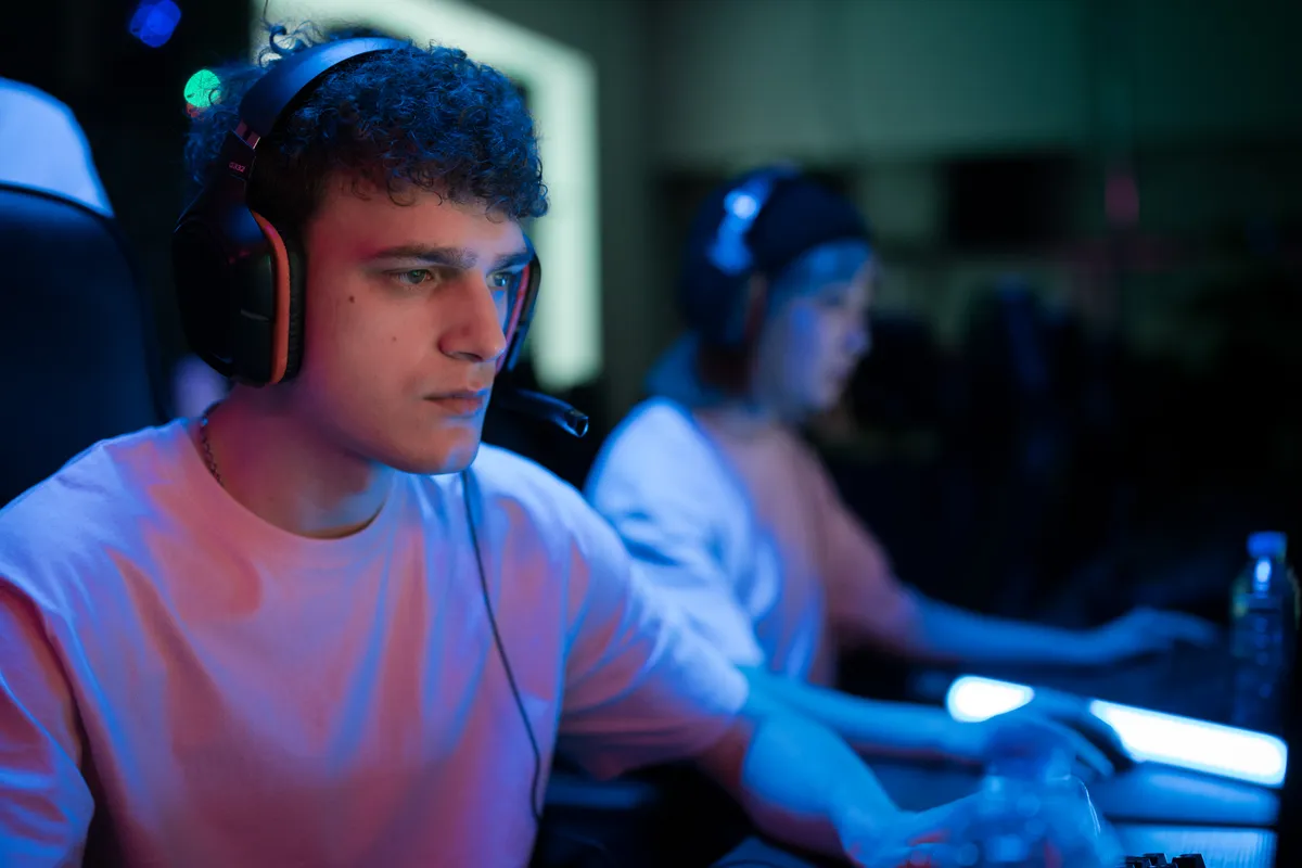 Player in a headset during an aim training session working to improve a low aim trainer score