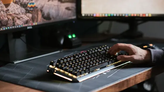 A mechanical keyboard with a keycap lifted to reveal the switch underneath, used to identify what switches it has