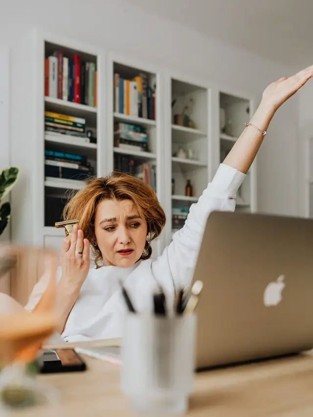 Frustrated woman reacting to a problem while using a computer